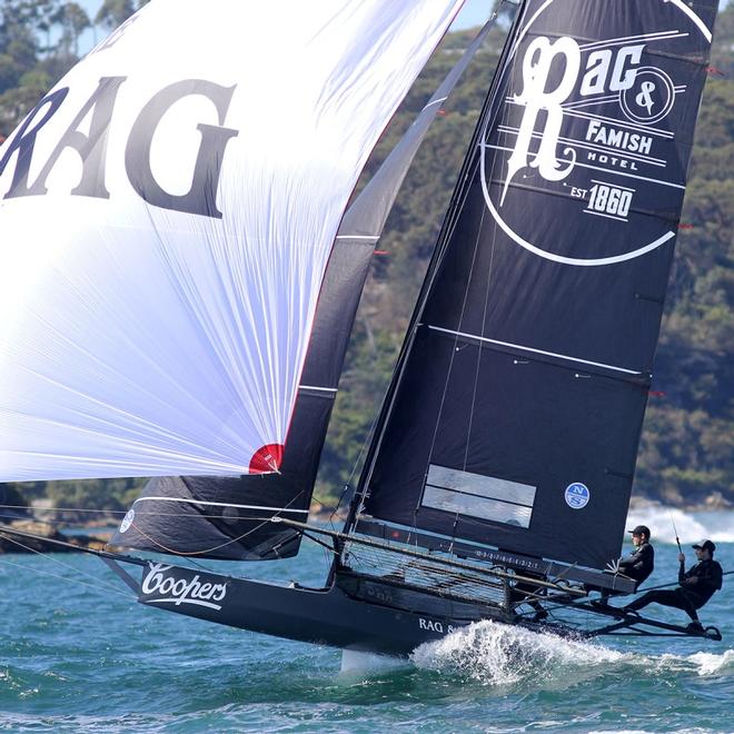 The Rag team ride a bow wave down the second run to the bottom mark ©  Frank Quealey / Australian 18 Footers League